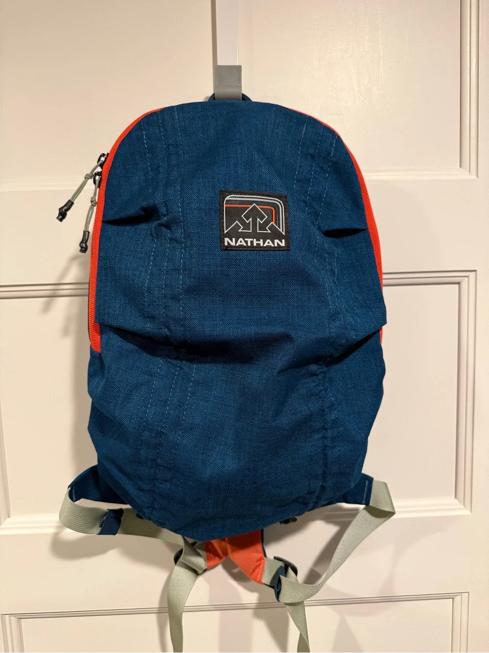 Nathan Navy and Orange Compact Outdoor Backpack